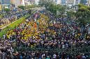 This aerial picture shows students protesting to demand a reduction in fuel prices and the dissolution of the free meal program, which they consider to be a hotbed of corruption, in Jakarta on June 12, 2026. (Photo by BAY ISMOYO / AFP)