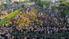 This aerial picture shows students protesting to demand a reduction in fuel prices and the dissolution of the free meal program, which they consider to be a hotbed of corruption, in Jakarta on June 12, 2026. (Photo by BAY ISMOYO / AFP)